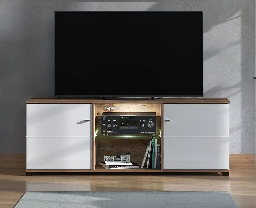 TV-Schrank / TV-Möbel mit zwei Türen Kanjiza 02, Farbe: Eiche Flagstaff / Weiß / Weiß Hochglanz, zwei Kabeldurchführungen, Maße: 59,5 x 157 x 40 cm, sechs Fächer